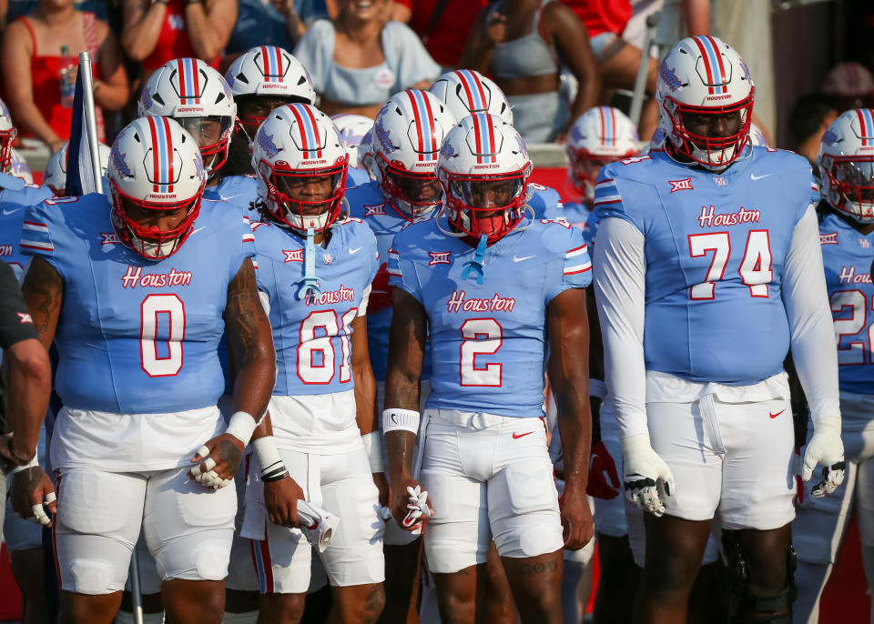 HOUSTON, TX- SEPTEMBER 02:  (left to right) Houston Cougars defensive lineman Sedrick Williams (0), Houston Cougars wide receiver CJ Nelson (81), Houston Cougars wide receiver Matthew Golden (2) and Houston Cougars offensive lineman Reuben Unije (74) wait to enter the field during the college football game between the UTSA Roadrunners and Houston Cougars on September 2, 2023 at TDECU Stadium in Houston, Texas.  (Photo by Leslie Plaza Johnson/Icon Sportswire via Getty Images)