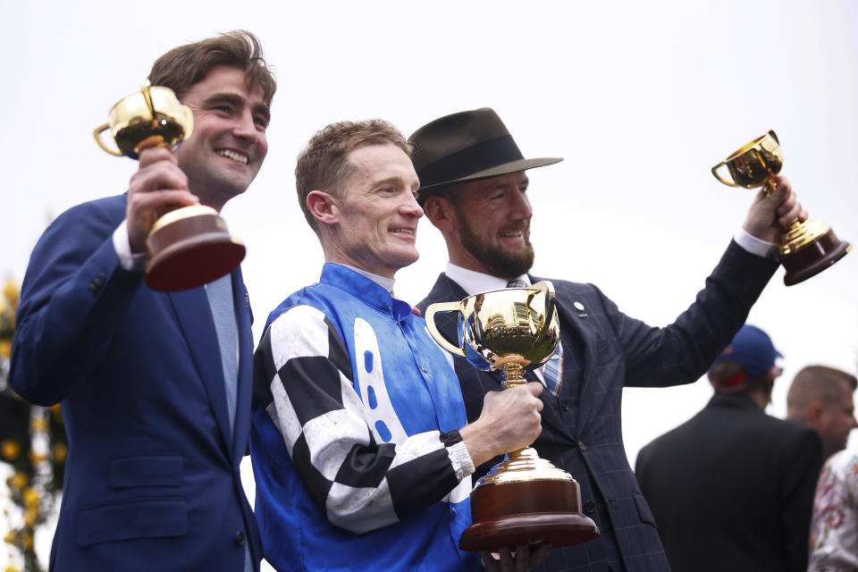 Trainers David Eustace, Ciaron Maher and jockey Mark Zahra, pictured here celebrating with the Melbourne Cup.