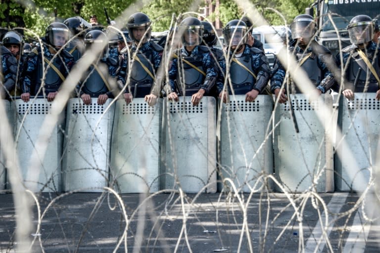 Armenian special police forces block a street during an opposition rally in central Yerevan on April 17, 2018