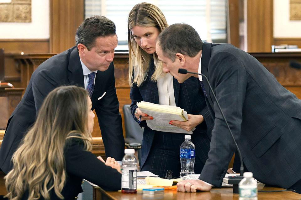 Karen Read, seated left, with defense team Alan Jackson, Elizabeth Little and David Yannetti. Opening arguments in the murder trial of Karen Read are set to get underway on Monday, April 29, at Dedham Superior Court.