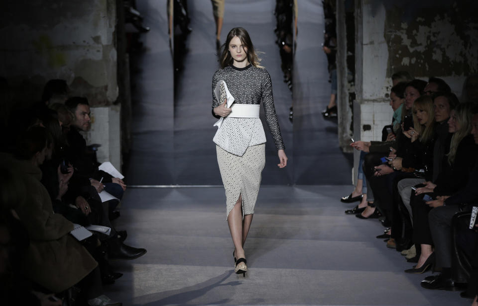 The Proenza Schouler Fall 2013 collection is modeled during Fashion Week in New York, Wednesday, Feb. 13, 2013. (AP Photo/Seth Wenig)