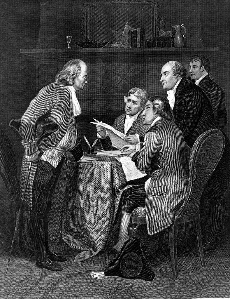 The committee chosen to draft a declaration of independence for the 13 North American British colonies is shown at work in this 19th century engraving. The five members are, from left, Benjamin Franklin, Thomas Jefferson, John Adams, Philip Livingston and Roger Sherman. On July 1, 1776, the committee submitted their draft to the Continental Congress, which voted on July 2 for final separation, and approved and formally adopted the Declaration of Independence on July 4. (AP Photo)