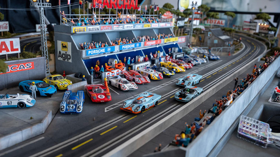 A close-up of the Slot Mods Porsche 917 Le Mans slot car race track's pit lane