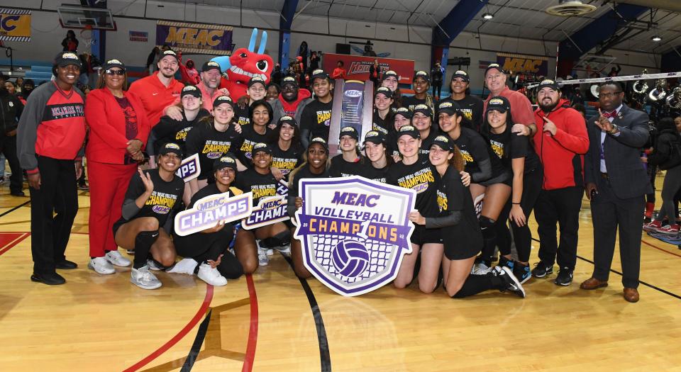 Delaware State celebrates after winning the MEAC title and reaching first NCAA Volleyball Tournament.