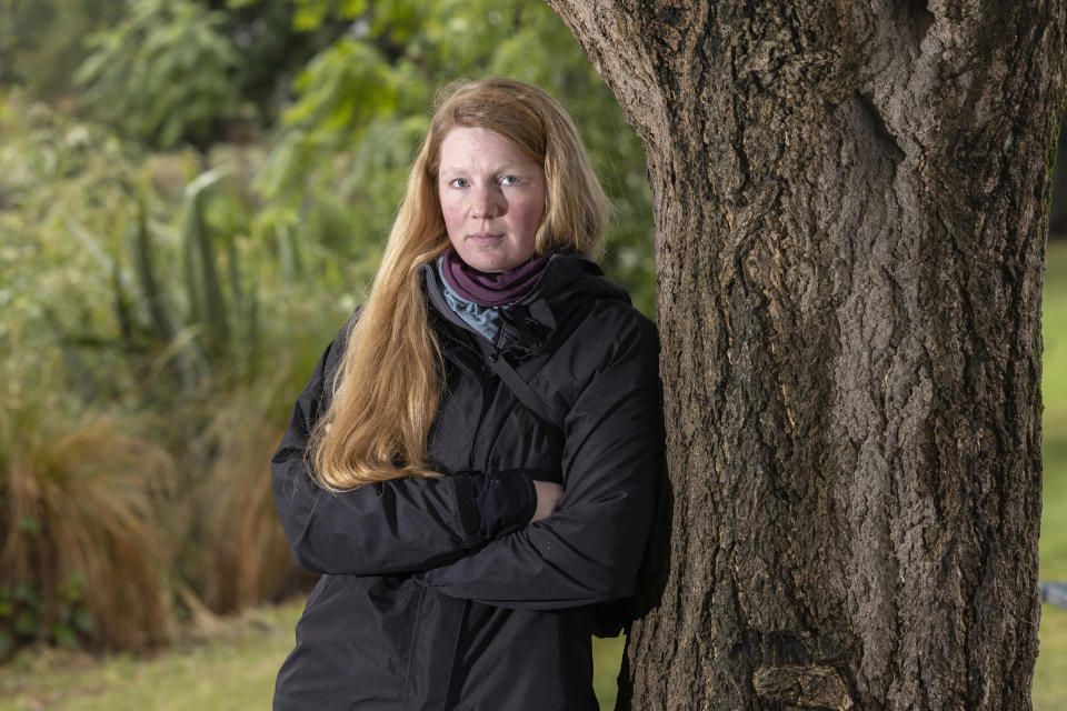 Liz Monahon poses for a photograph in Christchurch, New Zealand, Feb. 24, 2023. The Associated Press found a pattern of women working in Antarctica who said their claims of sexual harassment or assault had been minimized by their employers. The AP investigation came after the National Science Foundation published a report in 2022 in which 59% of women said they'd had a negative experience of harassment or assault while on the ice. (AP Photo/Peter Meecham)