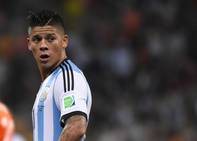 Marcos Rojo reacts during the second half of extra time during Argentina&#39;s World Cup semi-final against Netherlands in Sao Paulo on July 9, 2014 (AFP Photo/Fabrice Coffrini)