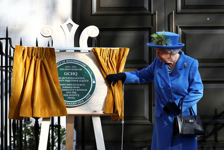 Britain's Queen Elizabeth visits Watergate House to mark the centenary of the GCHQ (Government Communications Head Quarters) in London, Britain, February 14, 2019. REUTERS/Hannah McKay/Pool