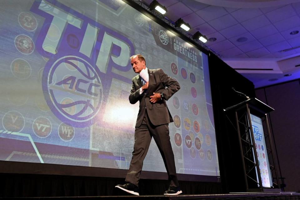 ACC Commissioner Jim Phillips secures his speech following his address to the media during the ACC Men’s TipOff event at the Hilton Charlotte Uptown Hotel on Wednesday, October 25, 2023 in Charlotte, NC.