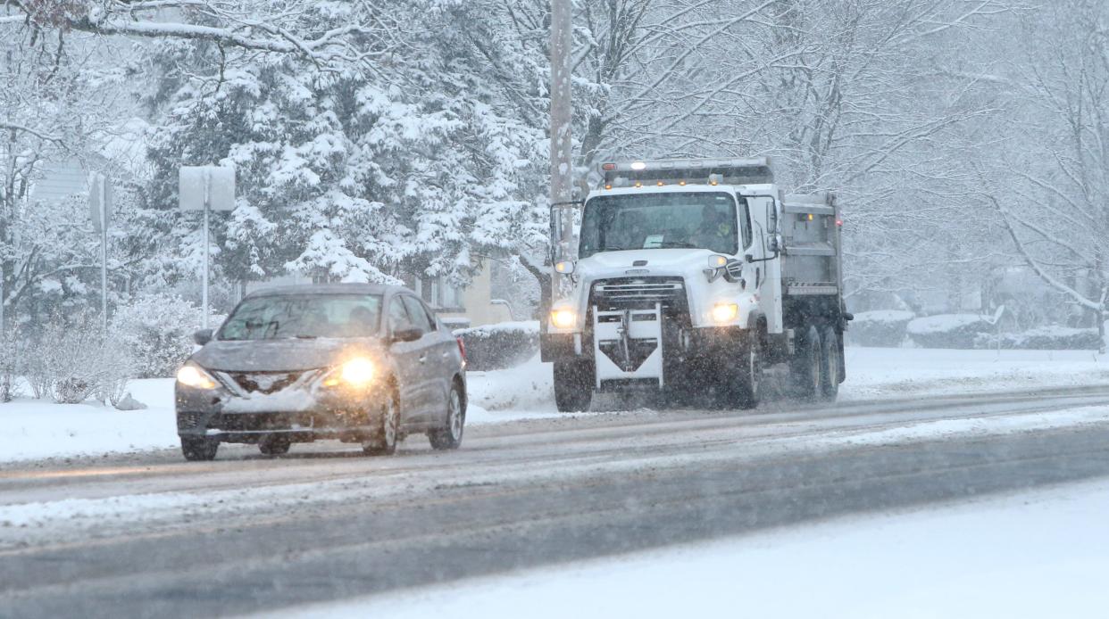 A city snow plow clears snow from Jefferson Boulevard on Wednesday, Jan. 25, 2023, in South Bend during the recent snowfall.