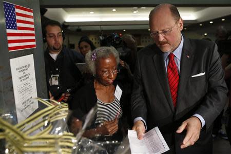 New York City Republican mayoral candidate Joe Lhota turns in his ballot for the Republican primary election in the Brooklyn borough of New York September 10, 2013. REUTERS/Brendan McDermid