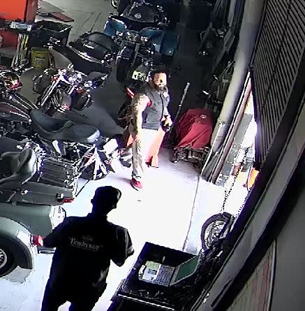 <em>Surveillance video showed three Hells Angels members, Stephen Alo, Richard DeVries and Cameron Treich, coming to the and storing their motorcycles in the business’ service area, transcripts said. (KLAS)</em>