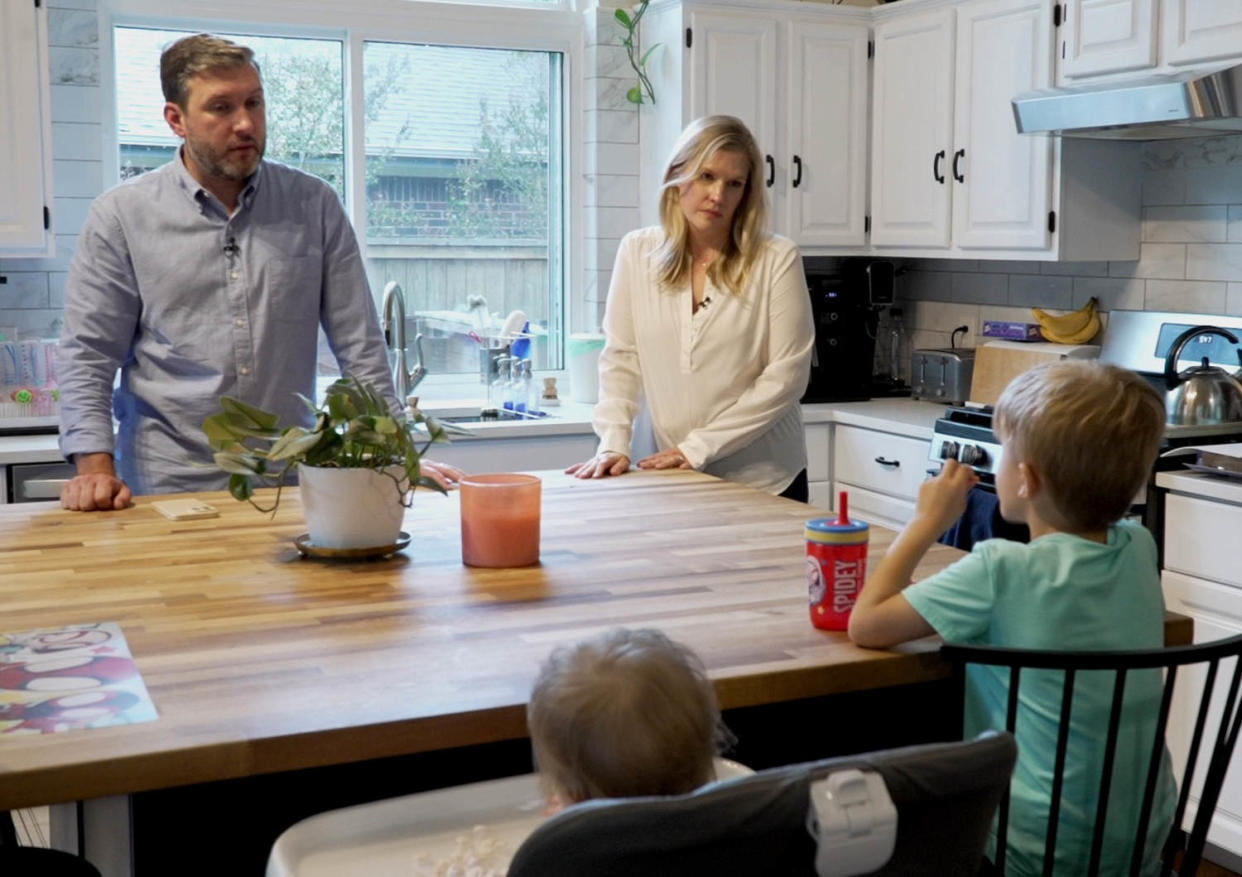 Kaitlyn Kash and her husband, Cory, at home with their two children. (NBC News)