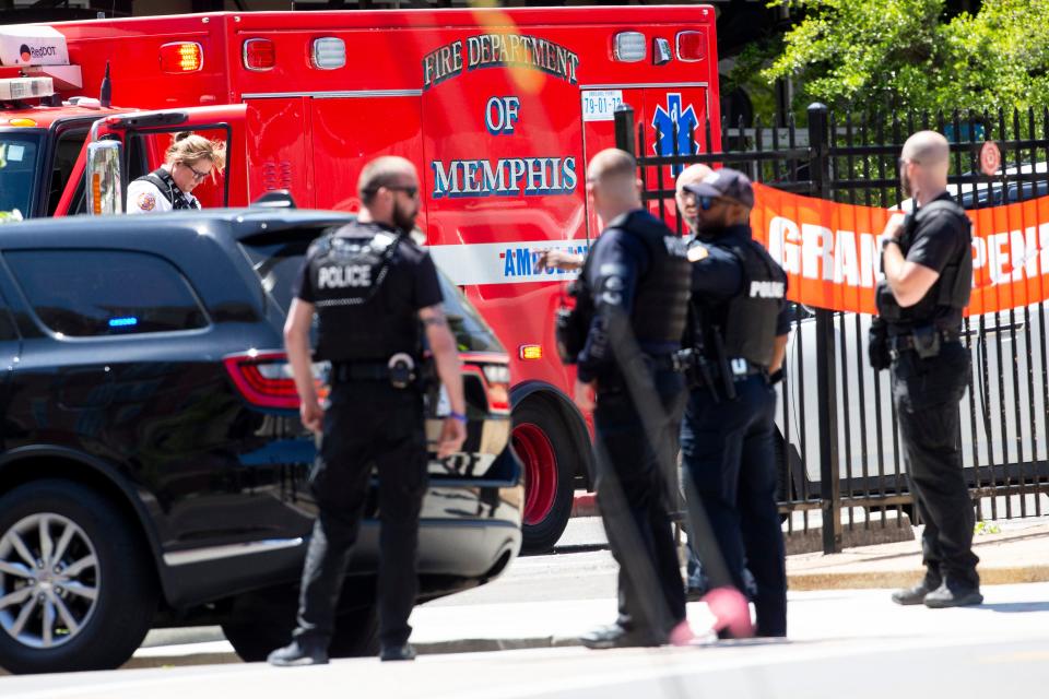 A Memphis Fire Department ambulance is brought close to Ubee’s as Memphis Police Department officers respond to an armed man at Ubee’s on Highland Street near the University of Memphis in Memphis, Tenn., on May 2, 2023. FOX13 News’ station, which is next to Ubee’s, reported that the man shot at the station. 