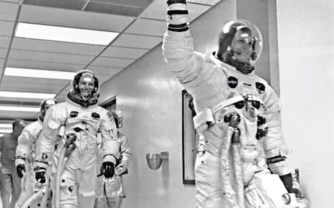 Apollo 11 commander Armstrong leads the way from the Kennedy Space Center to the launchpad - Credit: getty images