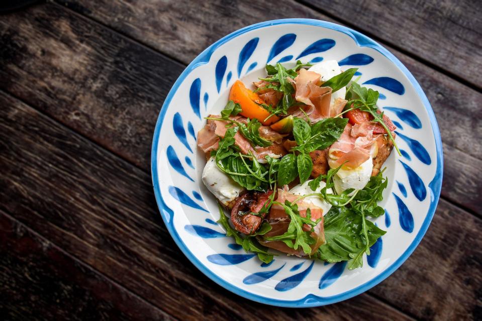 Cold cuts get a fresh look on Elisabetta's Roman Lunch plate, which combines prosciutto, cheeses, greens, tomatoes and wedges of pizza bianco. The restaurant has locations in West Palm Beach and Delray Beach.