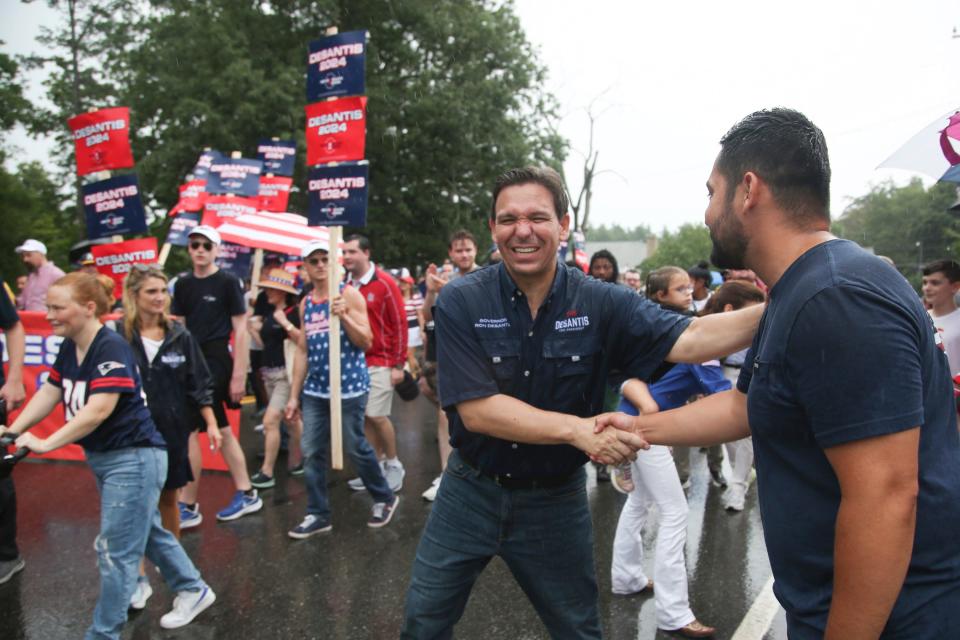 Republican presidential candidate and Florida Gov. Ron DeSantis, walks in the parade on July 4, 2023, in Merrimack, N.H.