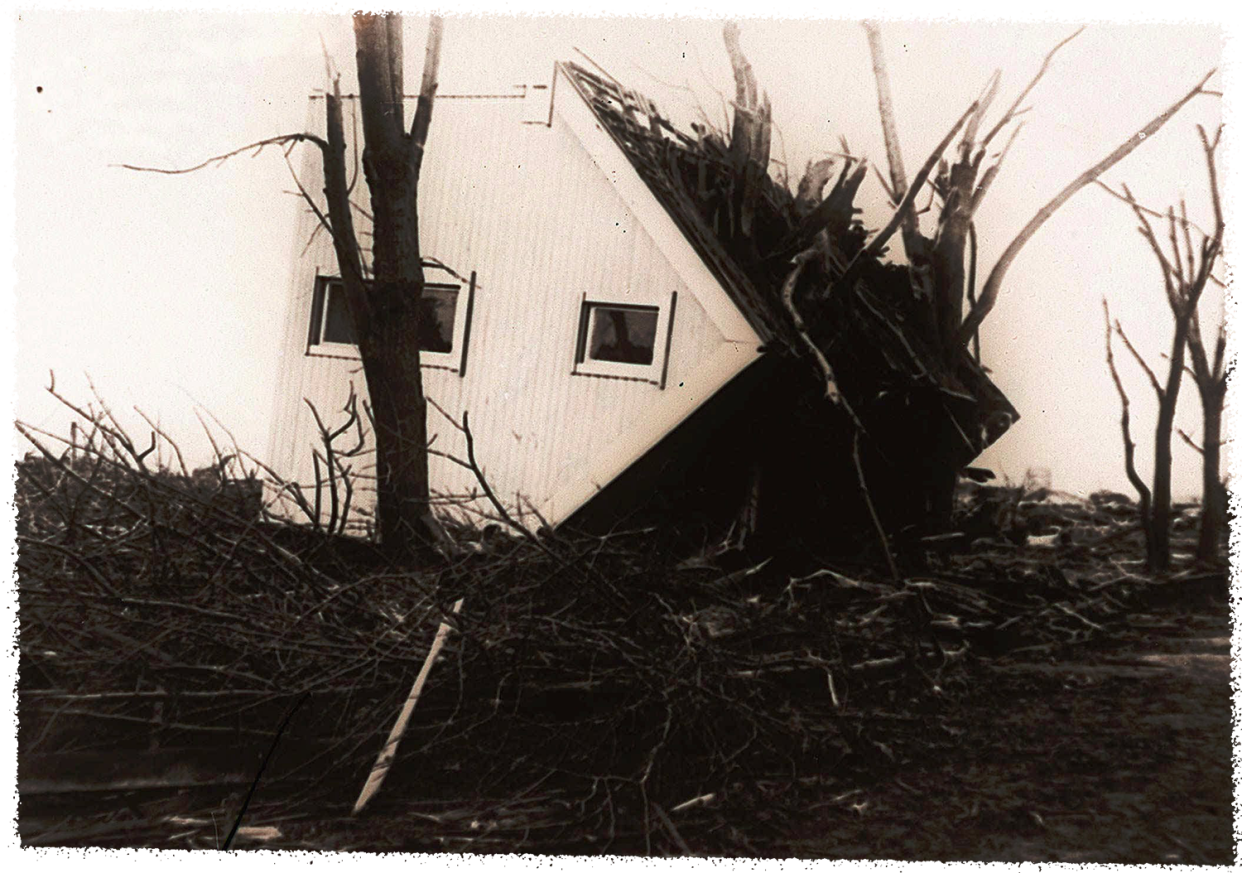A March 21, 1925 photo of an overturned house that was carried more than 50 feet from its foundation by a tornado at Griffin, Indiana. There were 54 dead and about 200 injured of the town population of 400.