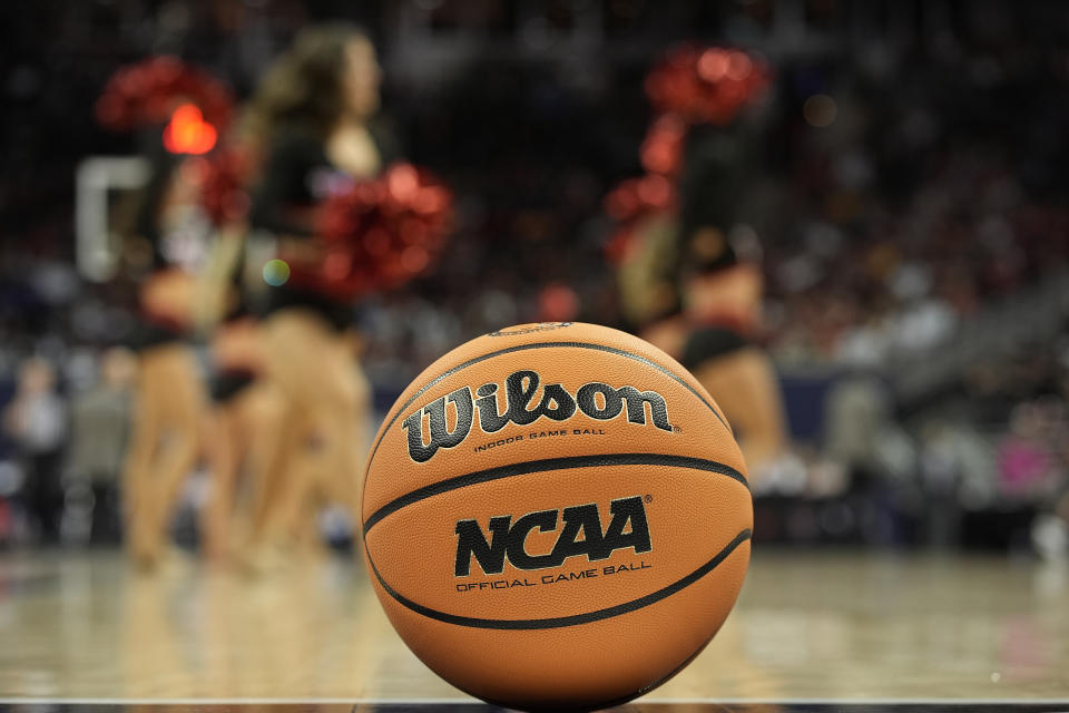 Texas Tech cheerleaders perform during the second half of an NCAA college basketball game against Houston in the semifinal round of the Big 12 Conference tournament, Friday, March 15, 2024, in Kansas City, Mo. (AP Photo/Charlie Riedel)