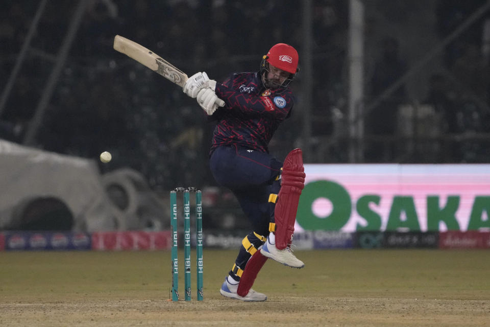 Islamabad United' Colin Munro plays a shot during the Pakistan Super League T20 cricket match between Peshawar Zalmi and Islamabad United, in Lahore, Pakistan, Monday, Feb. 26, 2024. (AP Photo/K.M. Chaudary)