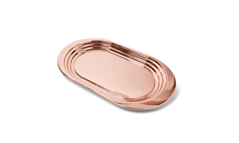 <p>Tom Dixon Plum Cooper-Plated Tray, $160, <a href="http://www.mrporter.com/en-us/mens/tom_dixon/plum-copper-plated-tray/742227?ppv=2" rel="nofollow noopener" target="_blank" data-ylk="slk:Mr Porter;elm:context_link;itc:0;sec:content-canvas" class="link ">Mr Porter</a></p>