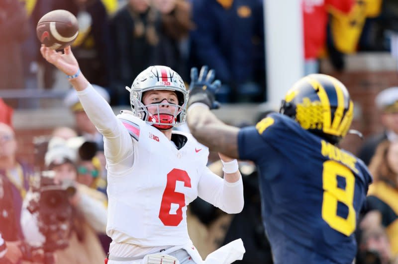 Ohio State quarterback Kyle McCord (L) led the Buckeyes to an 11-1 record this season. File Photo by Aaron Josefczyk/UPI