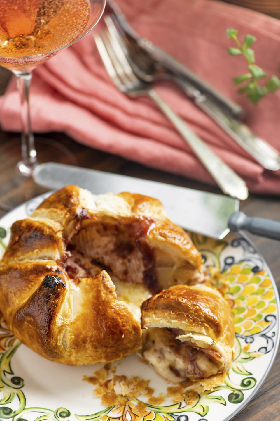 This November 2018 photo shows a recipe for Baked Brie en Croute with Raspberry Jam. (Cheyenne M. Cohen via AP)