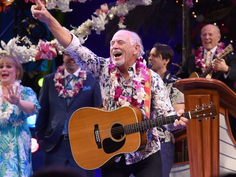 Jimmy Buffett (C) takes opening night bow during the Broadway premiere of "Escape to Margaritaville" the new musical featuring songs by Jimmy Buffett at the Marquis Theatre on March 15, 2018