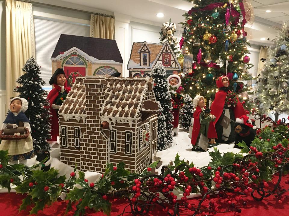 Paula MacNeil from Easton Country Estates created a Williamsburg village complete with caroler for the Easton Festival of Trees in 2020.
