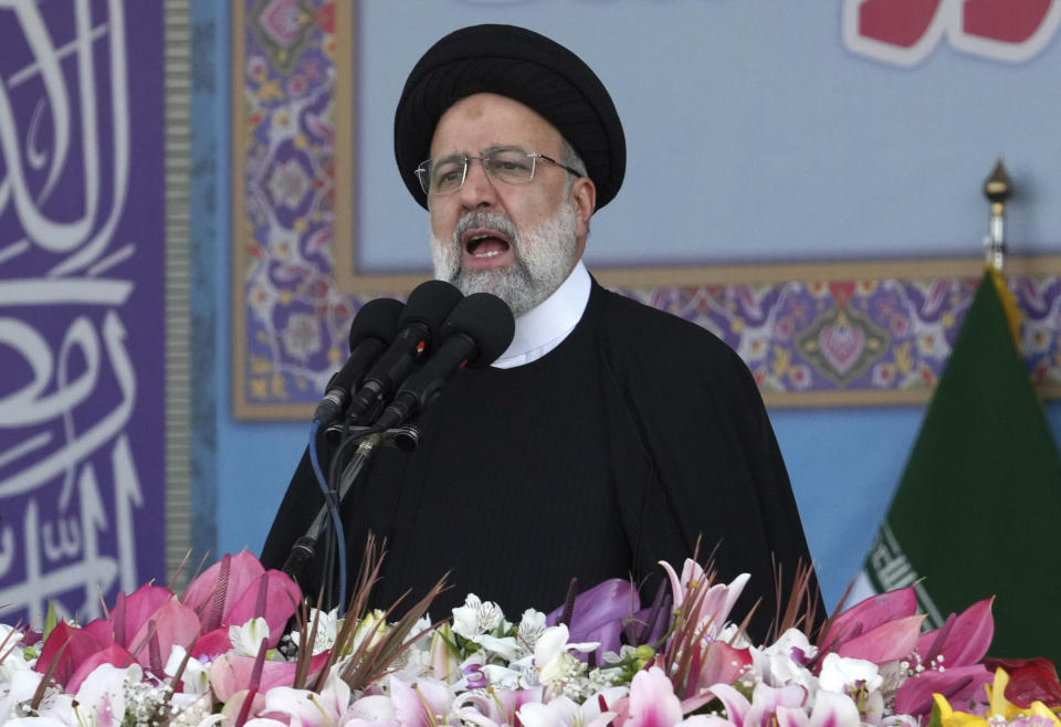 Iranian President Ebrahim Raisi speaks during during Army Day parade in front of the mausoleum of the late revolutionary founder Ayatollah Khomeini just outside Tehran, Iran, Tuesday, April 18, 2023. President Raisi reiterated threats against Israel while though he stayed away from criticizing Saudi Arabia as Tehran seeks a détente with the kingdom. (AP Photo/Vahid Salemi)