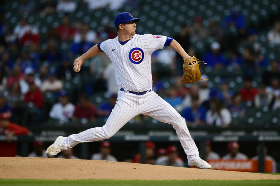 Chicago Cubs starter Alec Mills winds up during the first inning of the team's baseball game against the Cincinnati Reds on Wednesday, Sept. 8, 2021, in Chicago. (AP Photo/Paul Beaty)