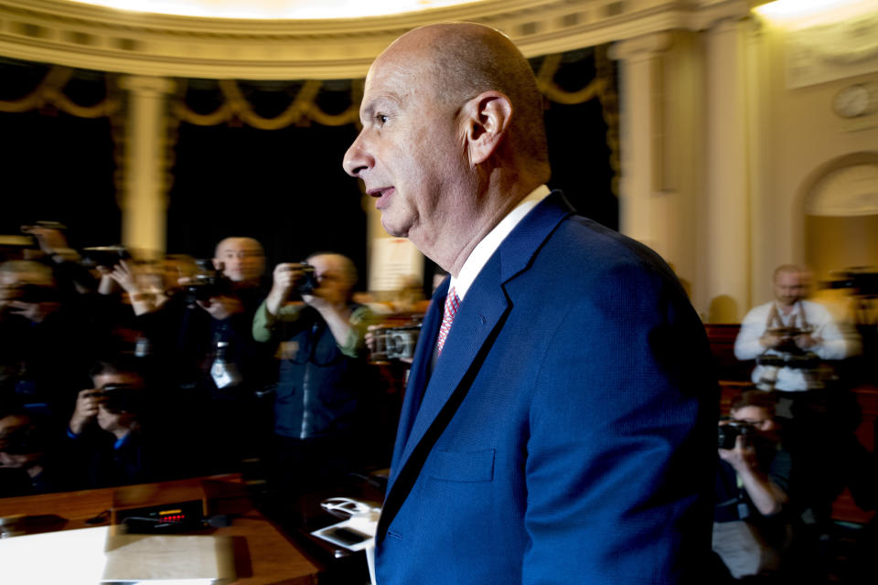 Ambassador Gordon Sondland, U.S. Ambassador to the European Union, returns from a break in testimony before the House Intelligence Committee on Capitol Hill in Washington, Wednesday, Nov. 20, 2019, during a public impeachment hearing of President Donald Trump's efforts to tie U.S. aid for Ukraine to investigations of his political opponents. (AP Photo/Andrew Harnik)