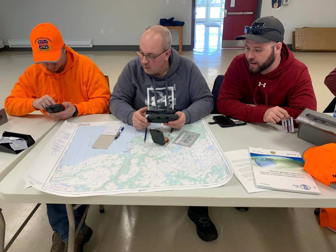 Members of the newly created Labrador Straits Search and Rescue Team learned a number of skills in recent workshops, including navigation when searching for missing persons. (Newfoundland and Labrador Search and Rescue Association - image credit)