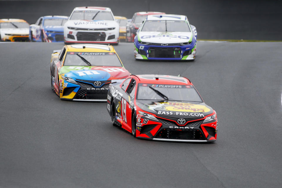 Martin Truex Jr. (19) competes in a NASCAR Cup Series auto race at Charlotte Motor Speedway in Concord, N.C., Sunday, Oct. 11, 2020. (AP Photo/Nell Redmond)