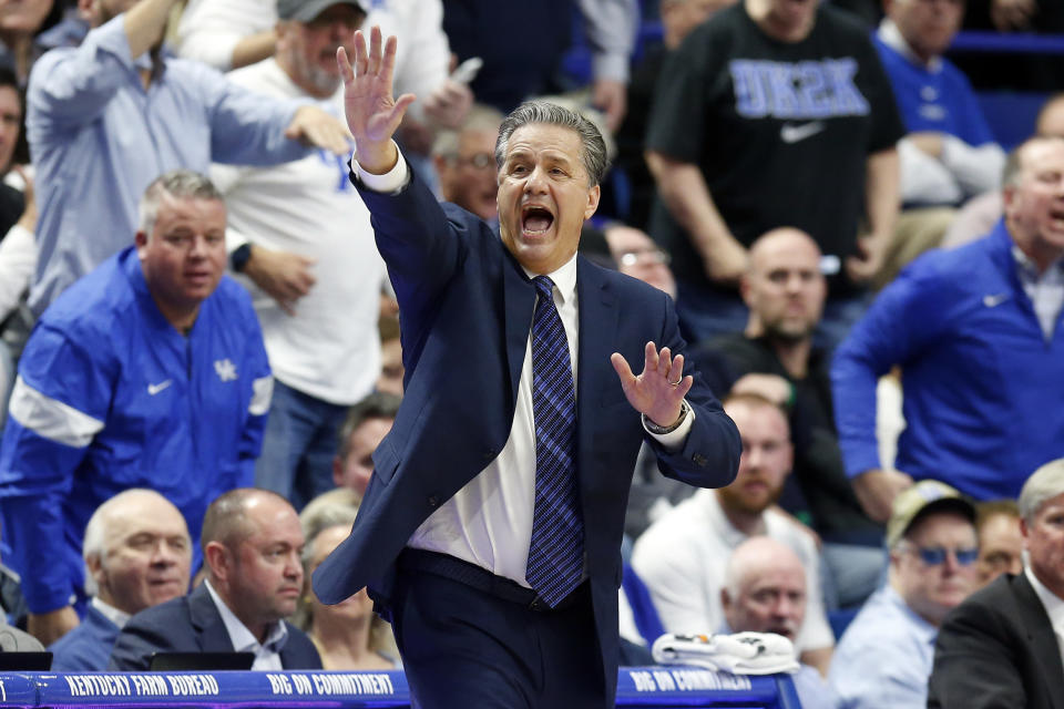 Kentucky coach John Calipari directs his team during the second half of an NCAA college basketball game against Louisville in Lexington, Ky., Saturday, Dec. 28, 2019. Kentucky won in overtime, 78-70. (AP Photo/James Crisp)