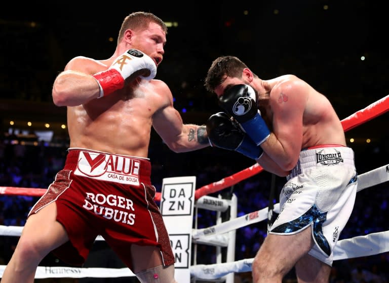Saul "Canelo" Alvarez lands a punch in his third-round technical knockout victory over Rocky Fielding in a WBA super middleweight title bout at Madison Square Garden