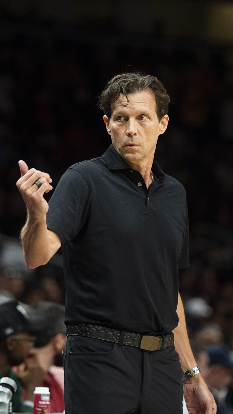 Atlanta Hawks coach Quin Snyder looks to the bench during the first half of the team's NBA basketball game against the Cleveland Cavaliers, Tuesday, March 28, 2023, in Atlanta. (AP Photo/Hakim Wright Sr.)