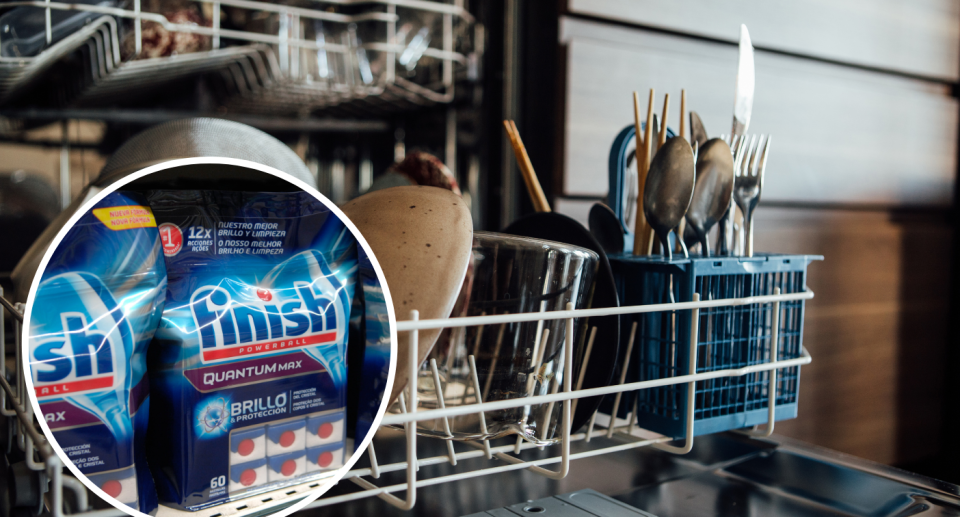 Dishwasher with plates and cutlery and finish dishwashing detergent.