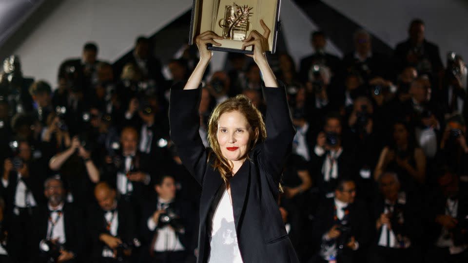 Director Justine Triet, Palme d'Or award winner for the film "Anatomie d'une chute" (Anatomy of a Fall), poses during the photocall after the closing ceremony of the 76th Cannes Film Festival in Cannes, France on May 27, 2023. - Sarah Meyssonnier/Reuters