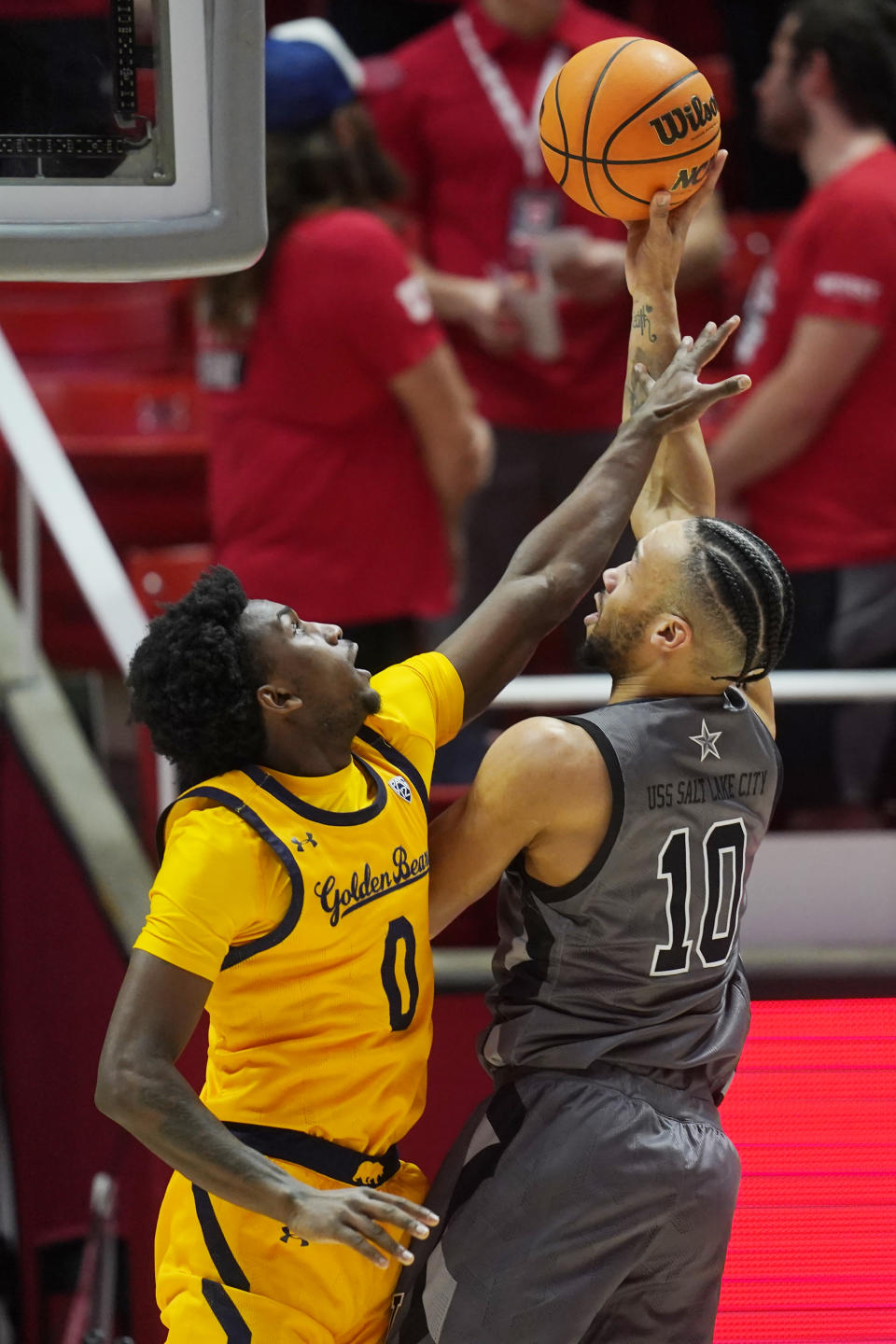 California guard Marsalis Roberson (0) defends against Utah guard Marco Anthony (10) during the first half of an NCAA college basketball game Sunday, Feb. 5, 2023, in Salt Lake City. (AP Photo/Rick Bowmer)