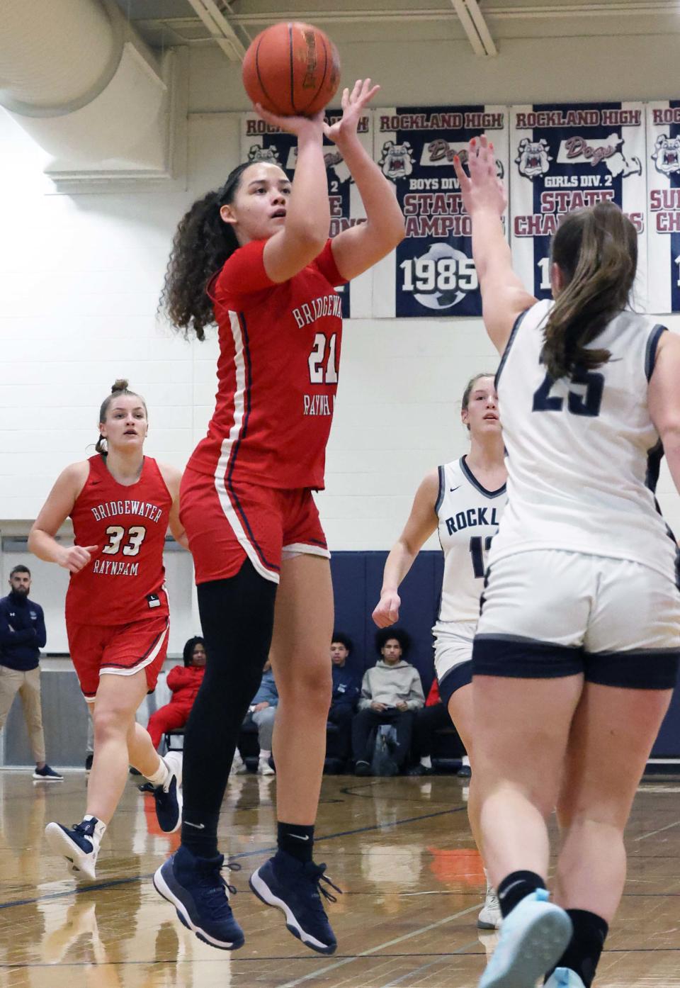 Bridgewater-Raynham's Natalia Hall-Rosa takes a shot at the basket over Rockland's Emma Cameron during  a game on Friday, Dec. 16, 2022.  