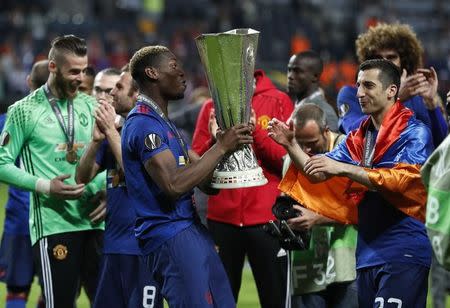 Football Soccer - Ajax Amsterdam v Manchester United - UEFA Europa League Final - Friends Arena, Solna, Stockholm, Sweden - 24/5/17 Manchester United's Henrikh Mkhitaryan and Paul Pogba celebrate with the trophy after winning the Europa League Reuters / Lee Smith Livepic