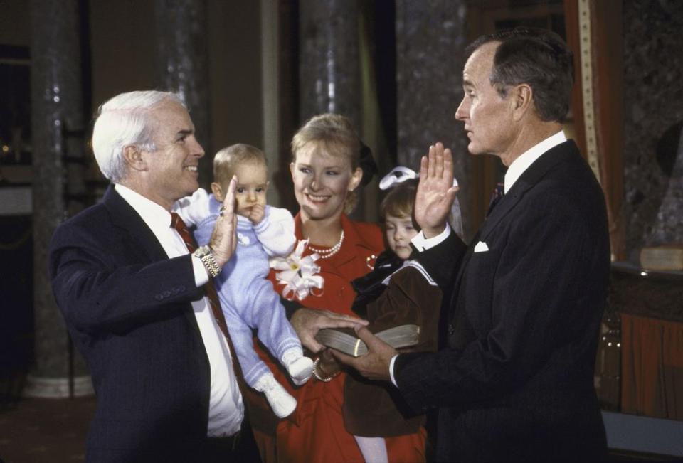 Vice President George H.W. Bush re-enacting Senate Swear-In with Sen. John S. McCain and his family.
