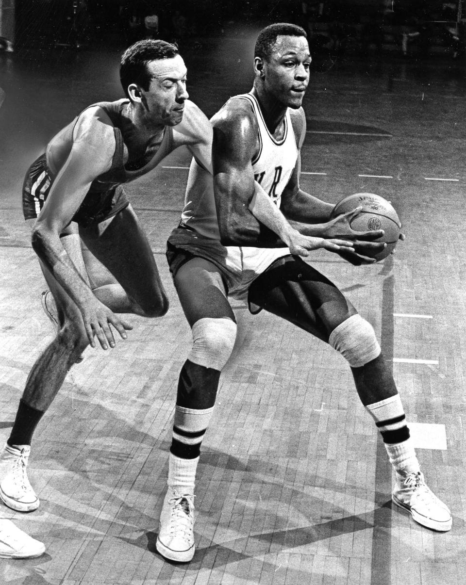 Bill Turner, right, during his time at the University of Akron.