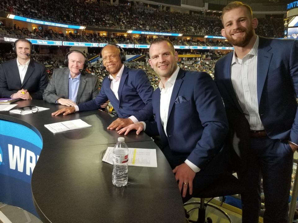 Shawn Kenney, far left, has helped broadcast the NCAA Championships for ESPN since 2008. Kenney worked with (from left) Jim Gibbons, Lee Kemp, J.D. Bergman, and David Taylor at PPG Paints Arena for the 2019 national tournament.