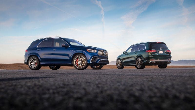 A photo of two Mercedes-Benz GLE SUVS. 