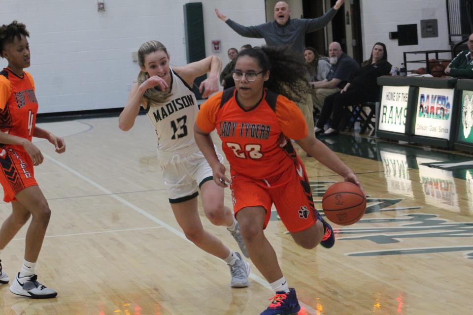 Mansfield Senior's Kiersten Bradley drives to the hoop for the Tygers.