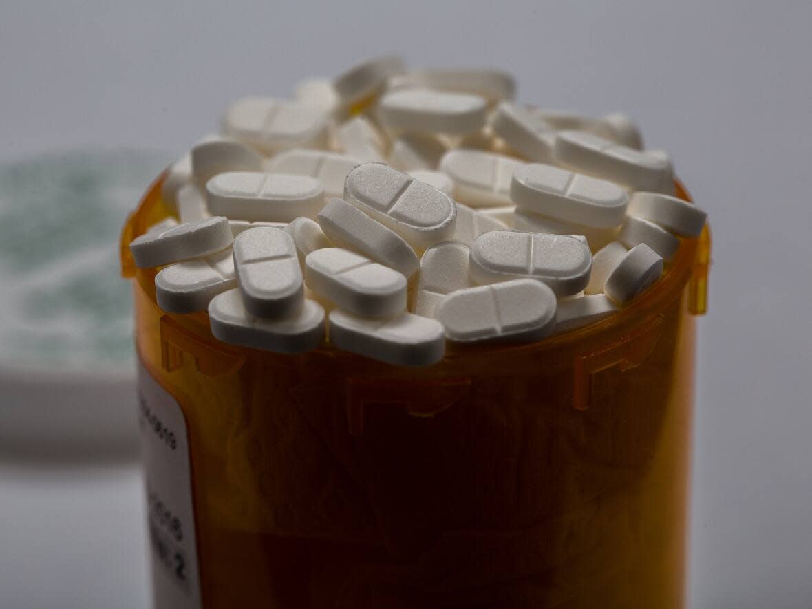 A prescription drug bottle is shown at a Toronto pharmacy. Telus Health employees will only be reimbursed for certain drug prescriptions if they fill them through the self-insured company's own virtual pharmacy, CBC News has learned.  (David Donnelly/CBC - image credit)