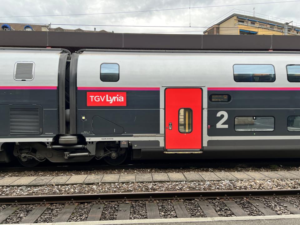 A side view of a TGV Lyria carriage at Geneva station