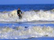 <p>Prince William surfing at St Andrews in Scotland in 2004, during the last year of his university course. (PA Images)</p> 