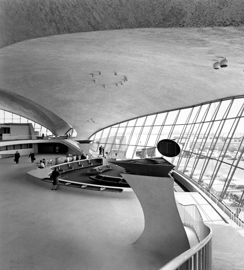 FILE - This May 29, 1962 file photo shows a curved ceiling and glass walls of the newly built Trans World Airway's terminal buiding at New York's Idlewild Airport. Today, the historic terminal, which was once on the National Trust for Historic Preservation list of endangered sites has been restored and serves as an entryway to the new JetBlue Terminal. Preservationists are continuing to work with the Port Authority of New York and New Jersey and JetBlue to sensitively reuse the terminal. (AP Photo, File)